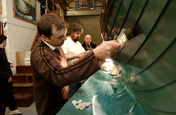 Galley painters hard at work applying finishing touches to the Galley.  Photo courtesy of Millgaet Media.