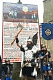 The 2007 Guizer Jarl Graham Nicolson flanked by his sons Jack and Scott in front of his Bill placed at the Market Cross.   Photo courtesy of Millgaet Media.